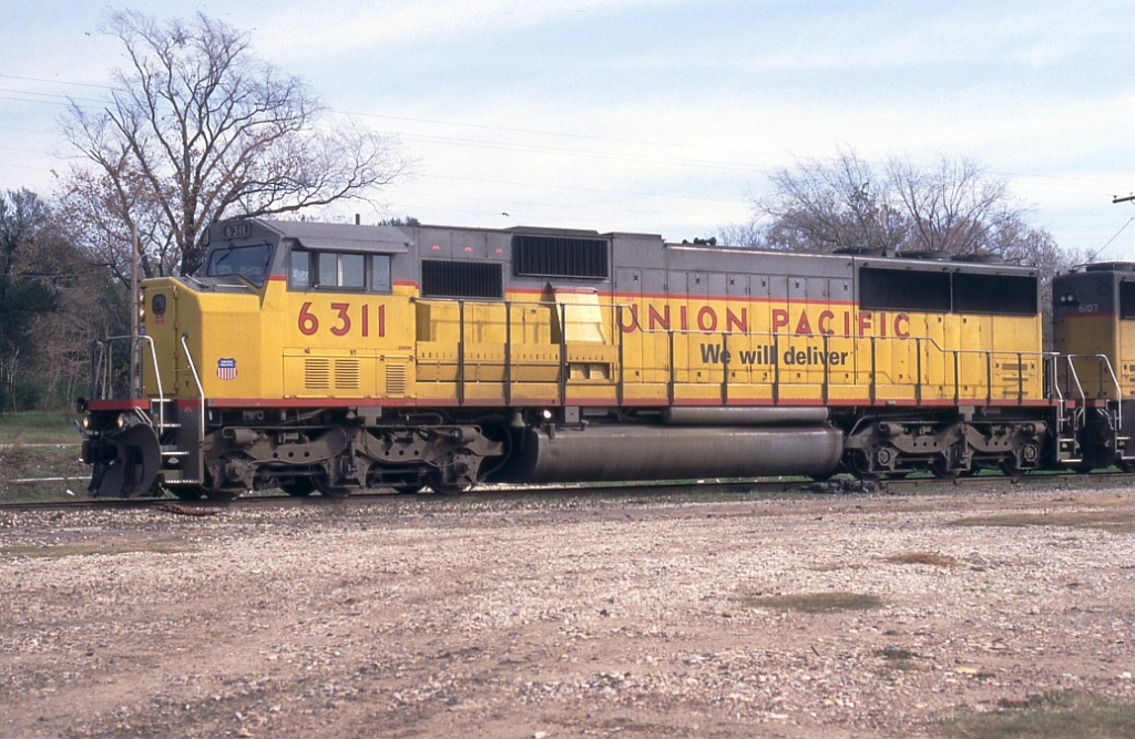 UP 6311 leading a NB autorack
